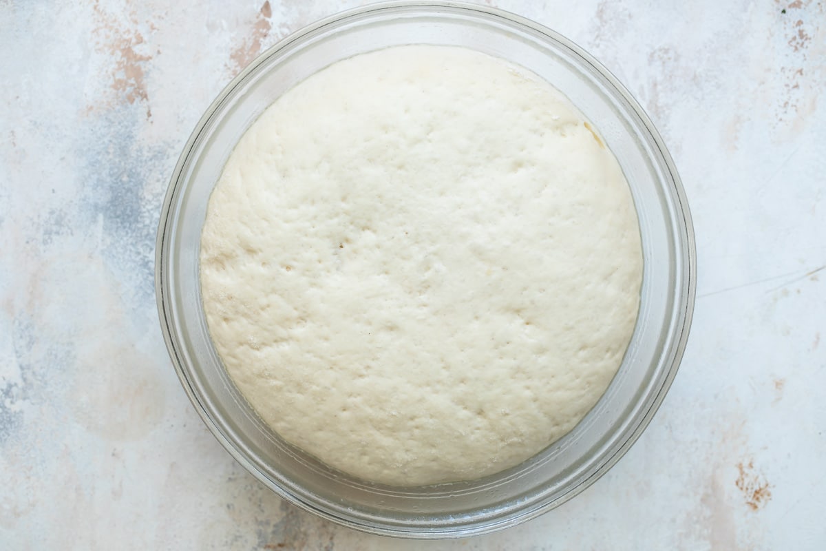 A bowl of dough for homemade pretzels.