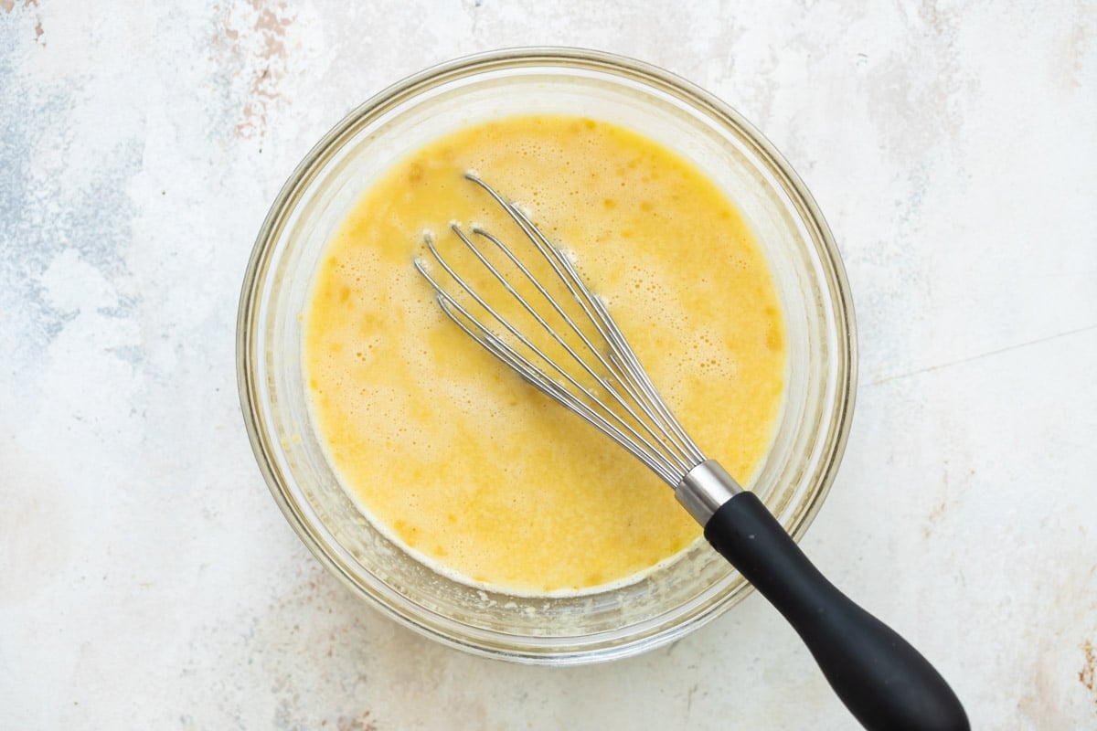 Cooking ground mustard to make yellow mustard.