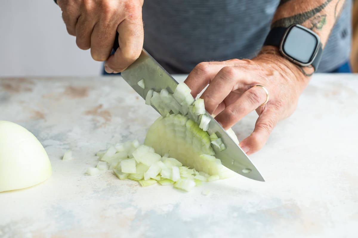 Dicing an onion.