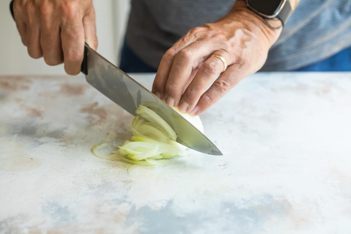 Slicing an onion.