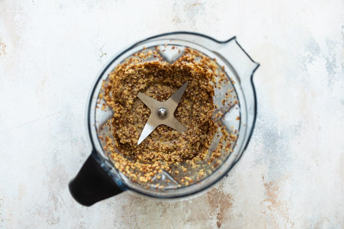 Whole grain mustard in a blender.