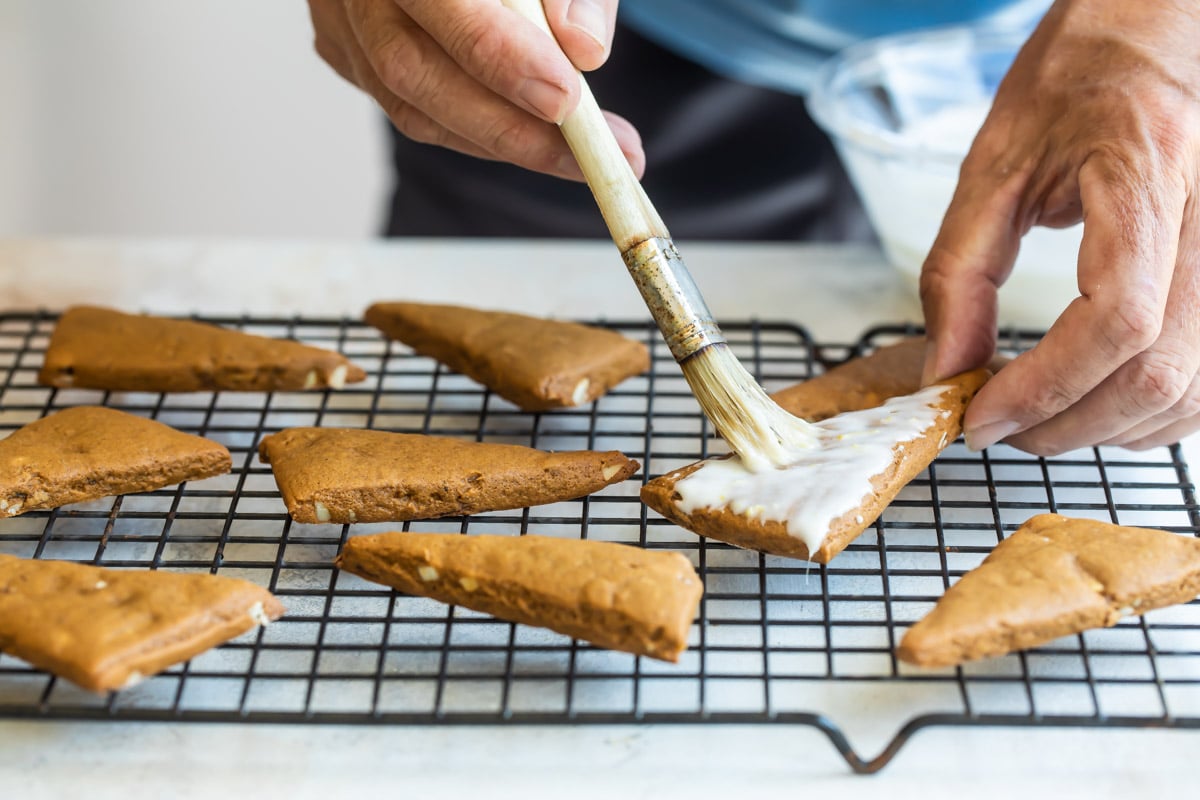 Baked Lebkuchen cooling on a baking rack.