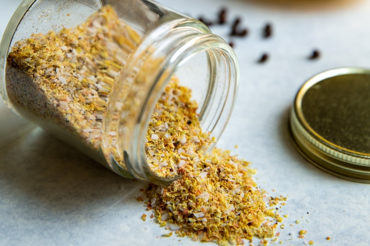 A jar of homemade lemon pepper seasoning.