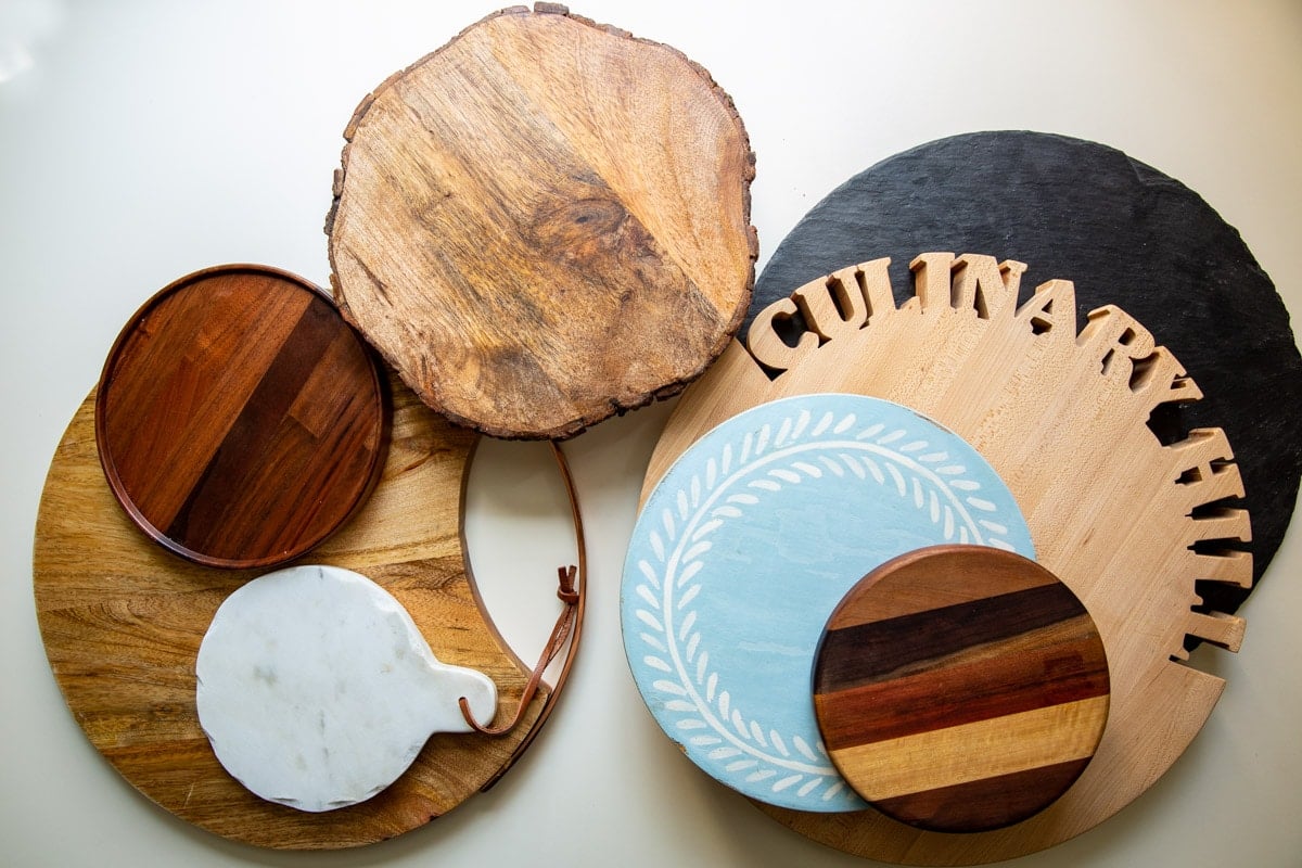 A collection of boards and platters for charcuterie display.