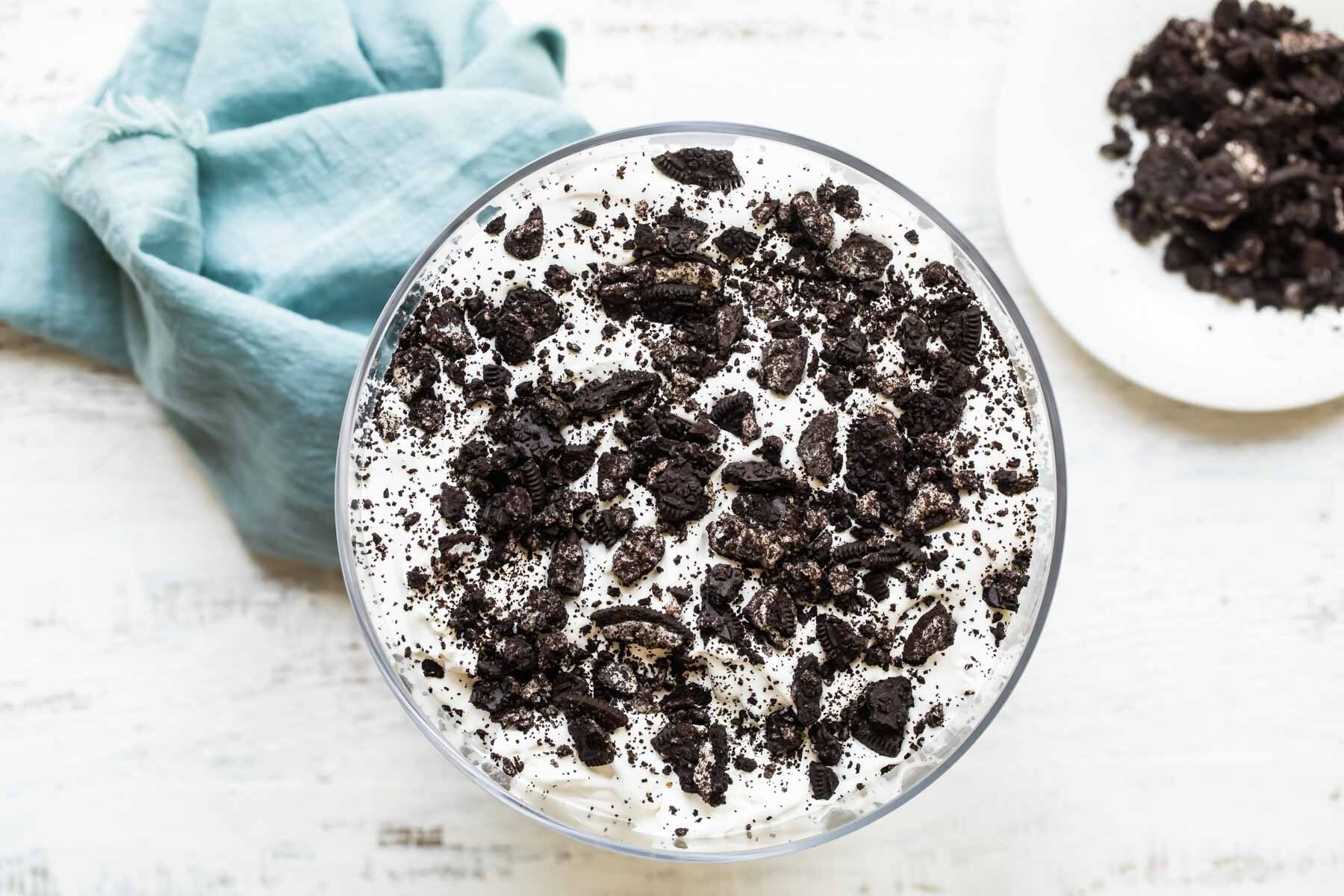 Oreo brownie trifle assembled in a trifle dish.
