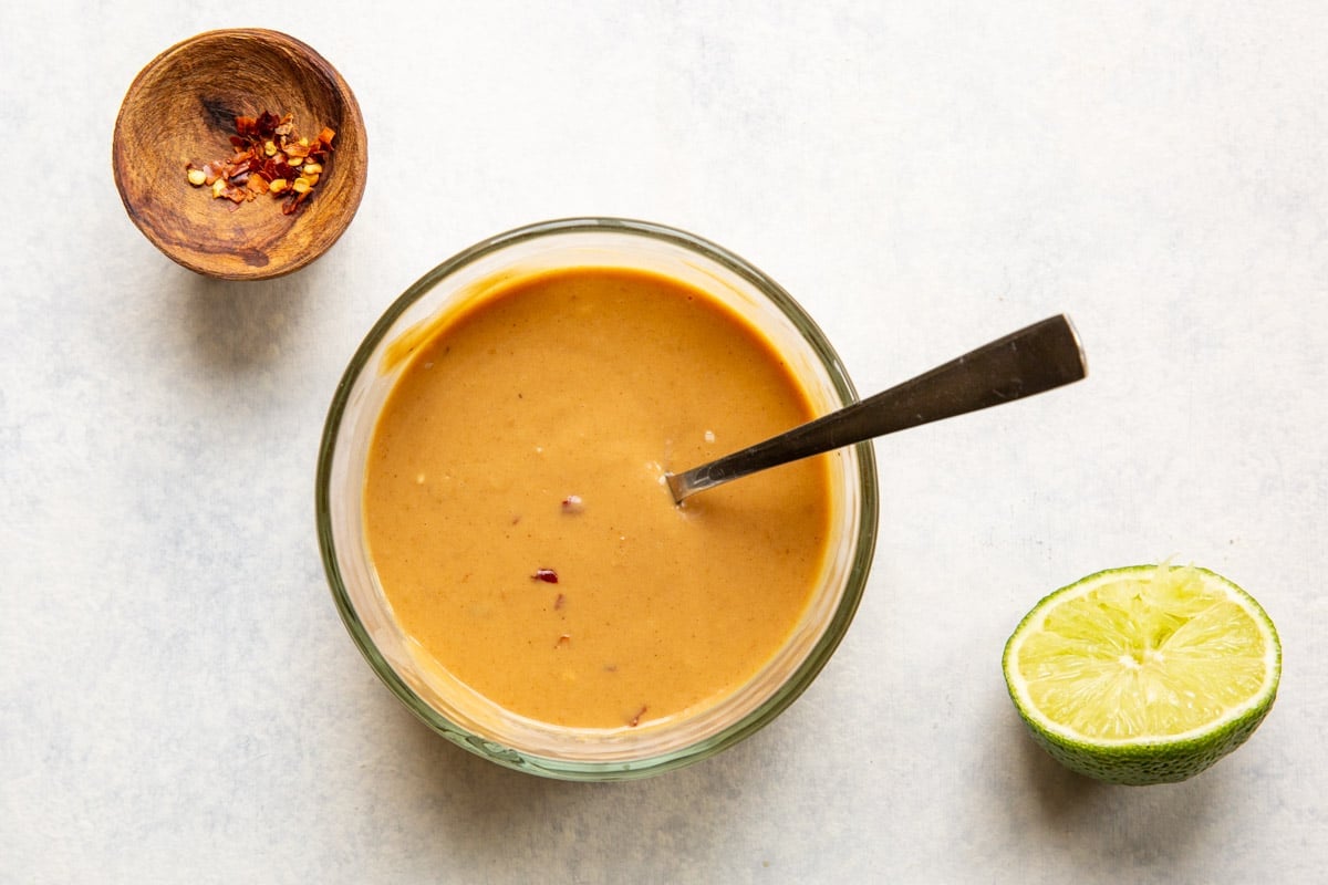 A bowl of Thai peanut dressing.