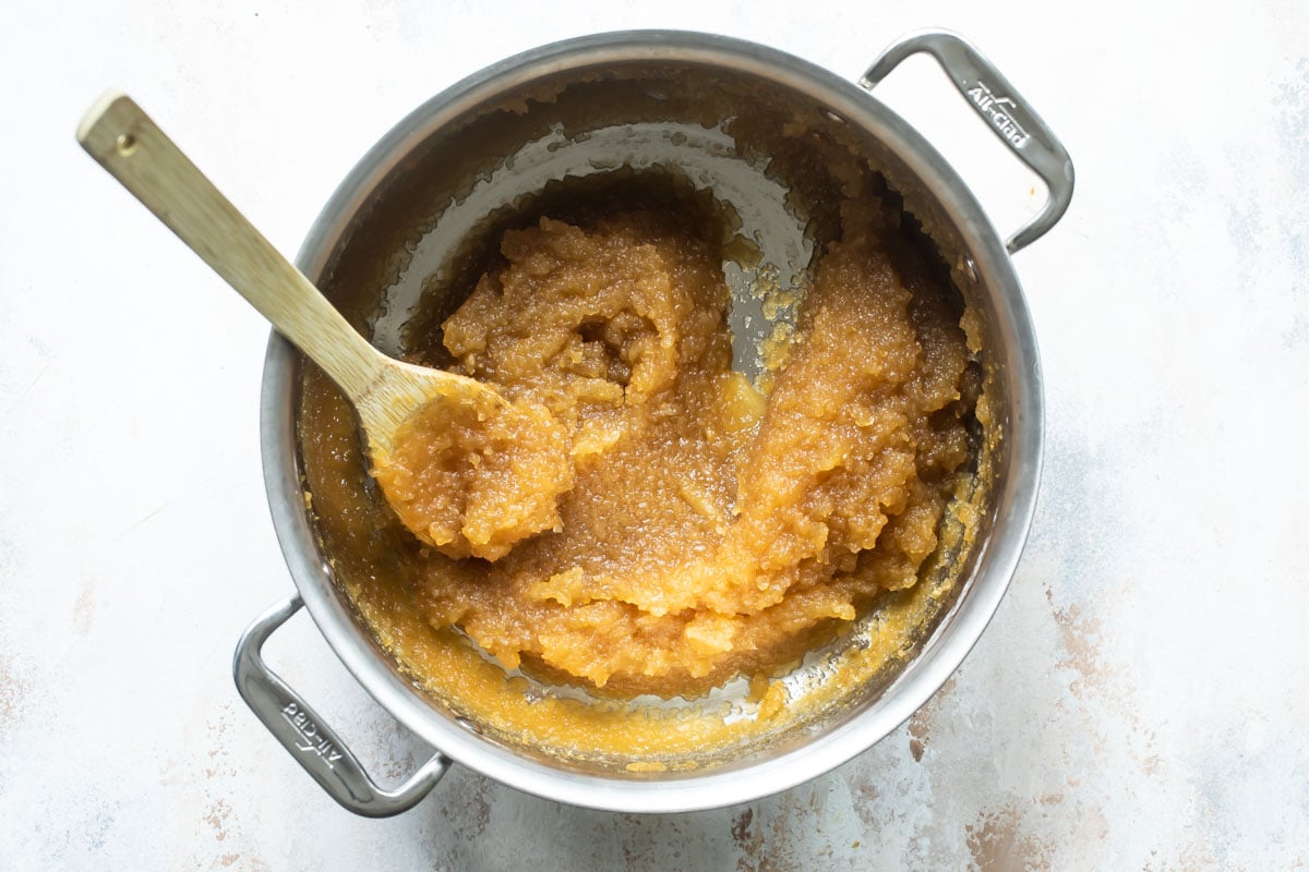 Apple butter in a silver stock pot.