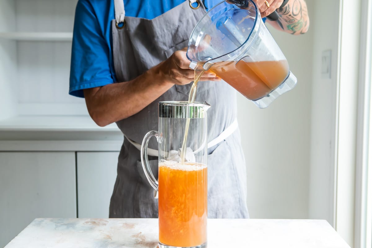 A pitcher of arnold palmer (iced tea and lemonade).