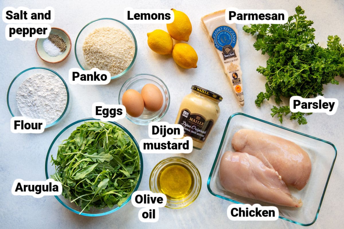 Chicken milanese ingredients in bowls.