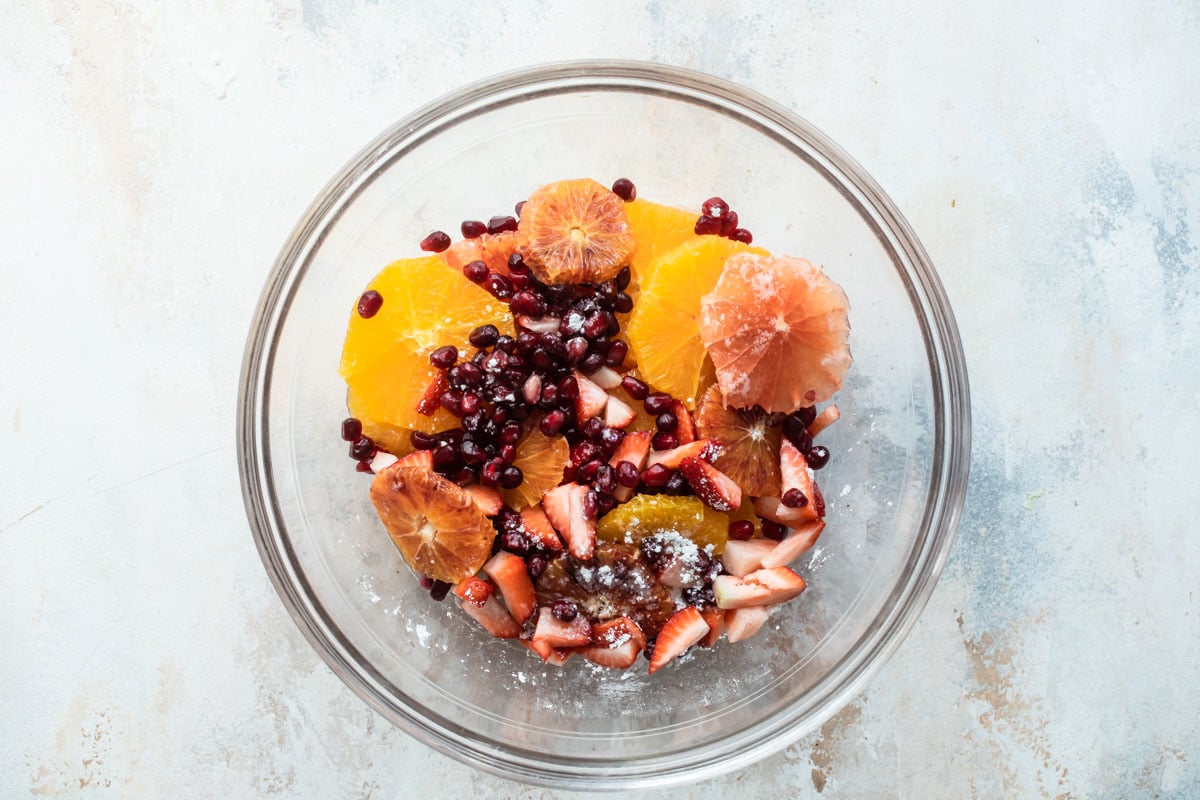Citrus salad in a clear bowl.
