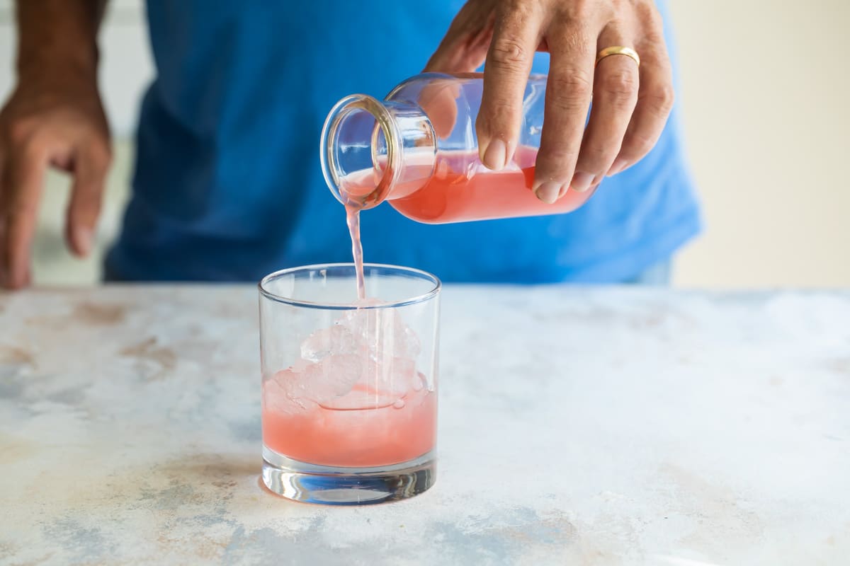 Mixing a Greyhound cocktail.