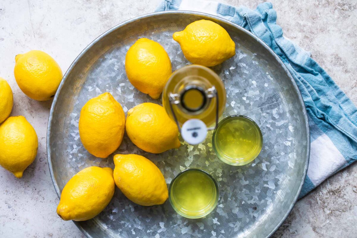 A glass bottle full of Limoncello.