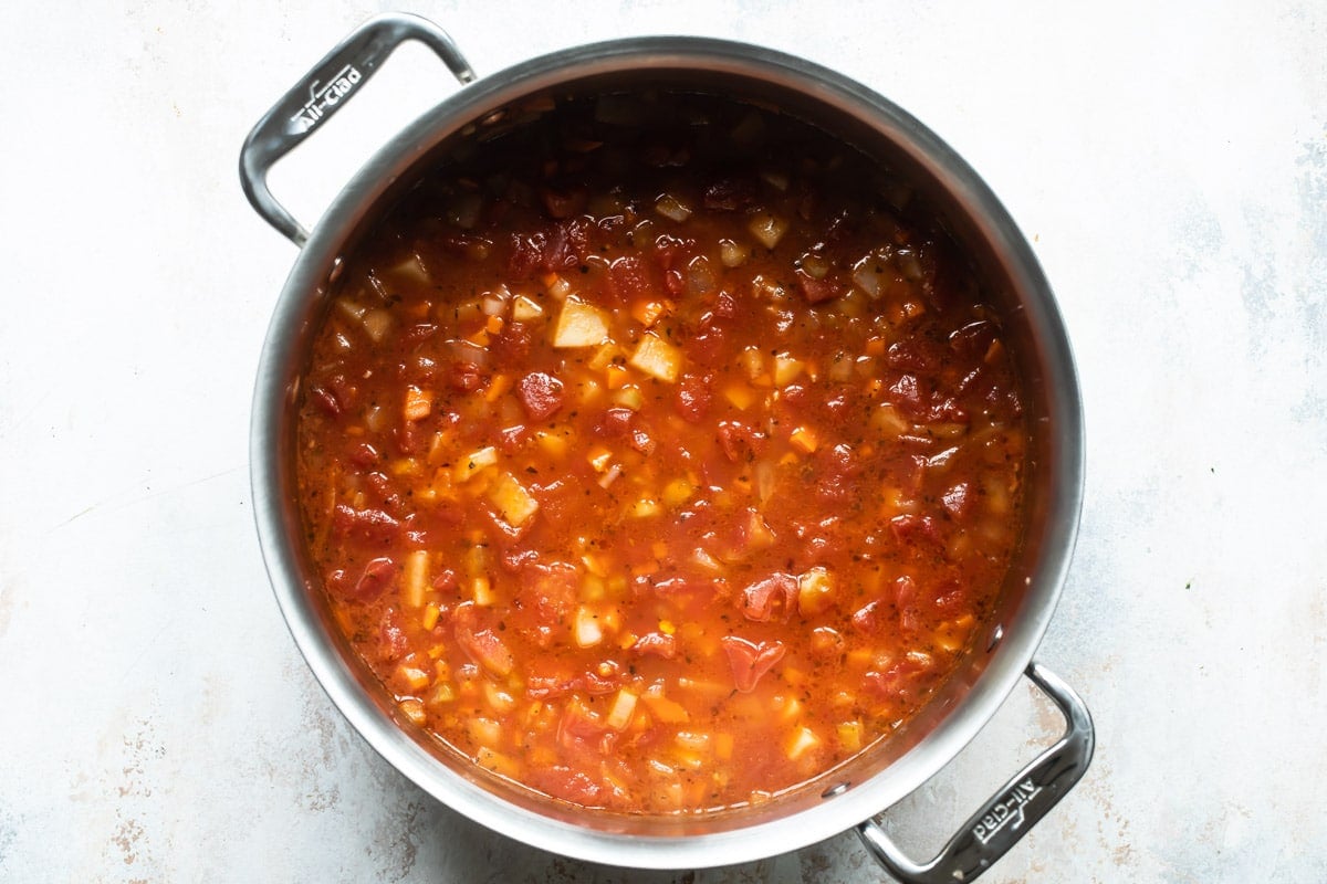 A pot of Manhattan clam chowder soup.