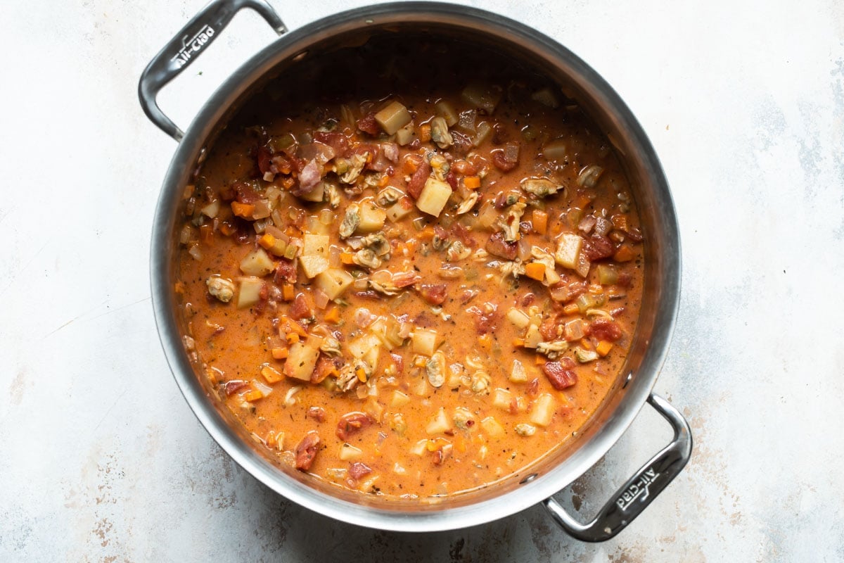A pot of Manhattan clam chowder soup.