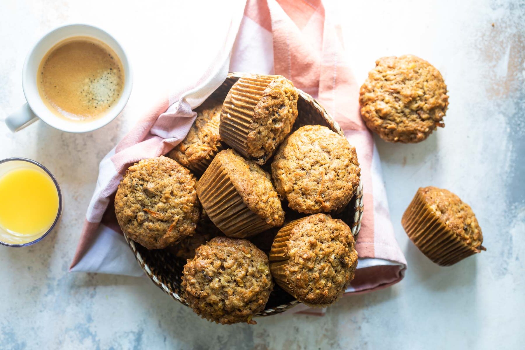 A basket filled with morning glory muffins.