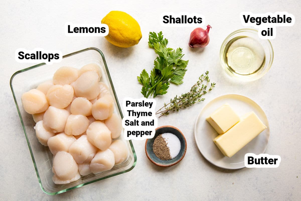 Labeled ingredients for pan-seared scallops with lemon butter.