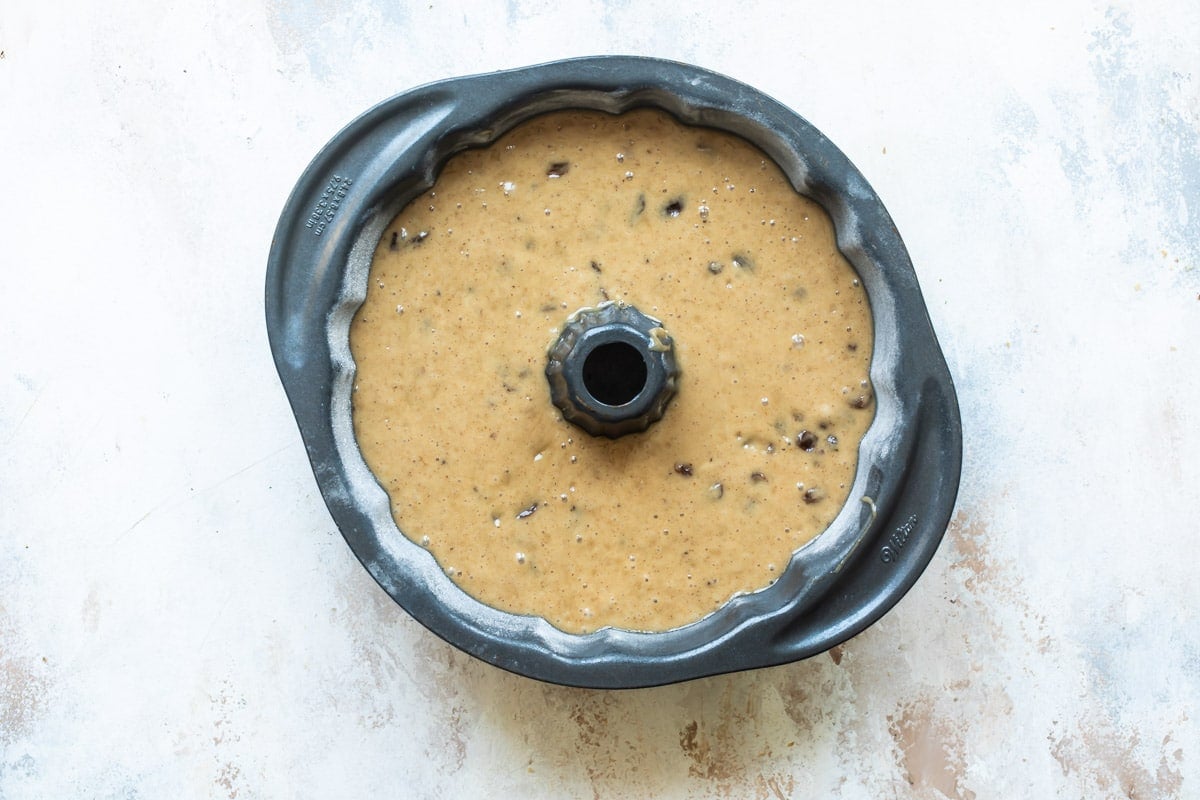 Spice cake batter in a bundt pan.