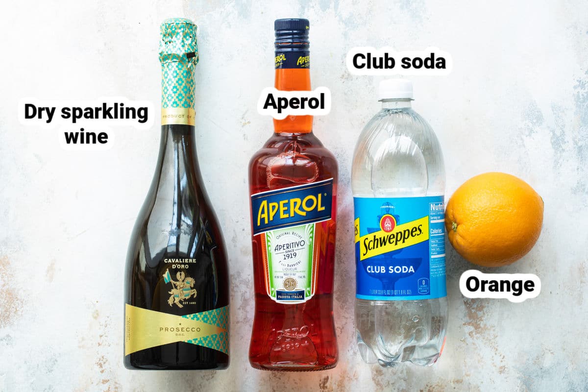 Labeled ingredients for Aperol Spritz.