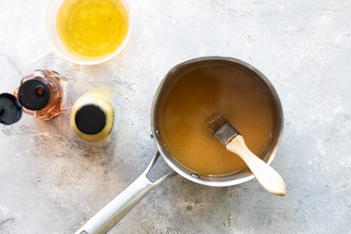 Apple glaze in a saucepan.