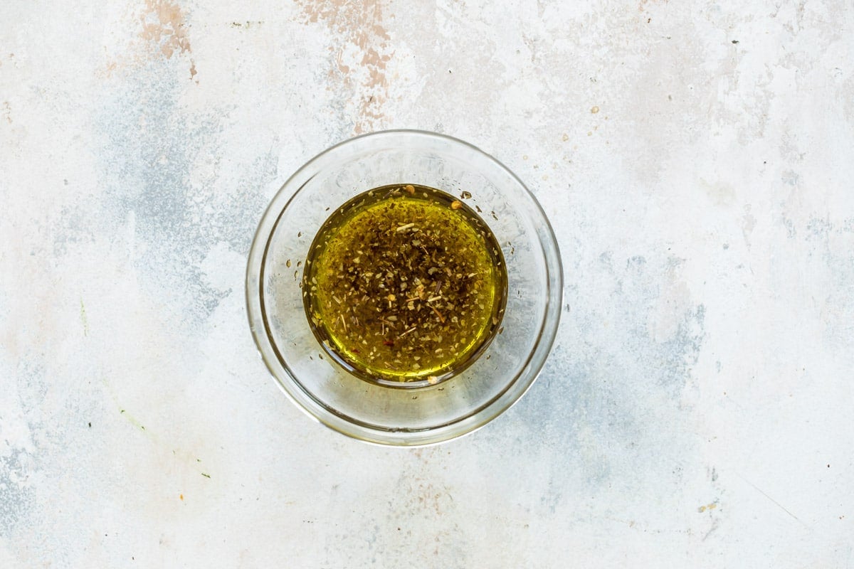 Dipping oil in a clear bowl.