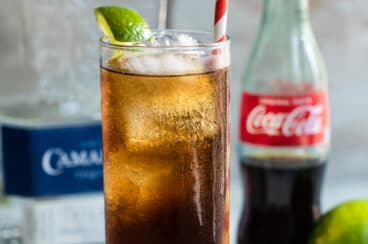 A Charro Negro cocktail in a highball glass.