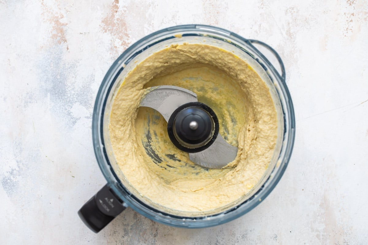 Homemade hummus in a food processor.