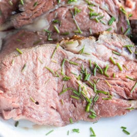 A platter of sliced prime rib.