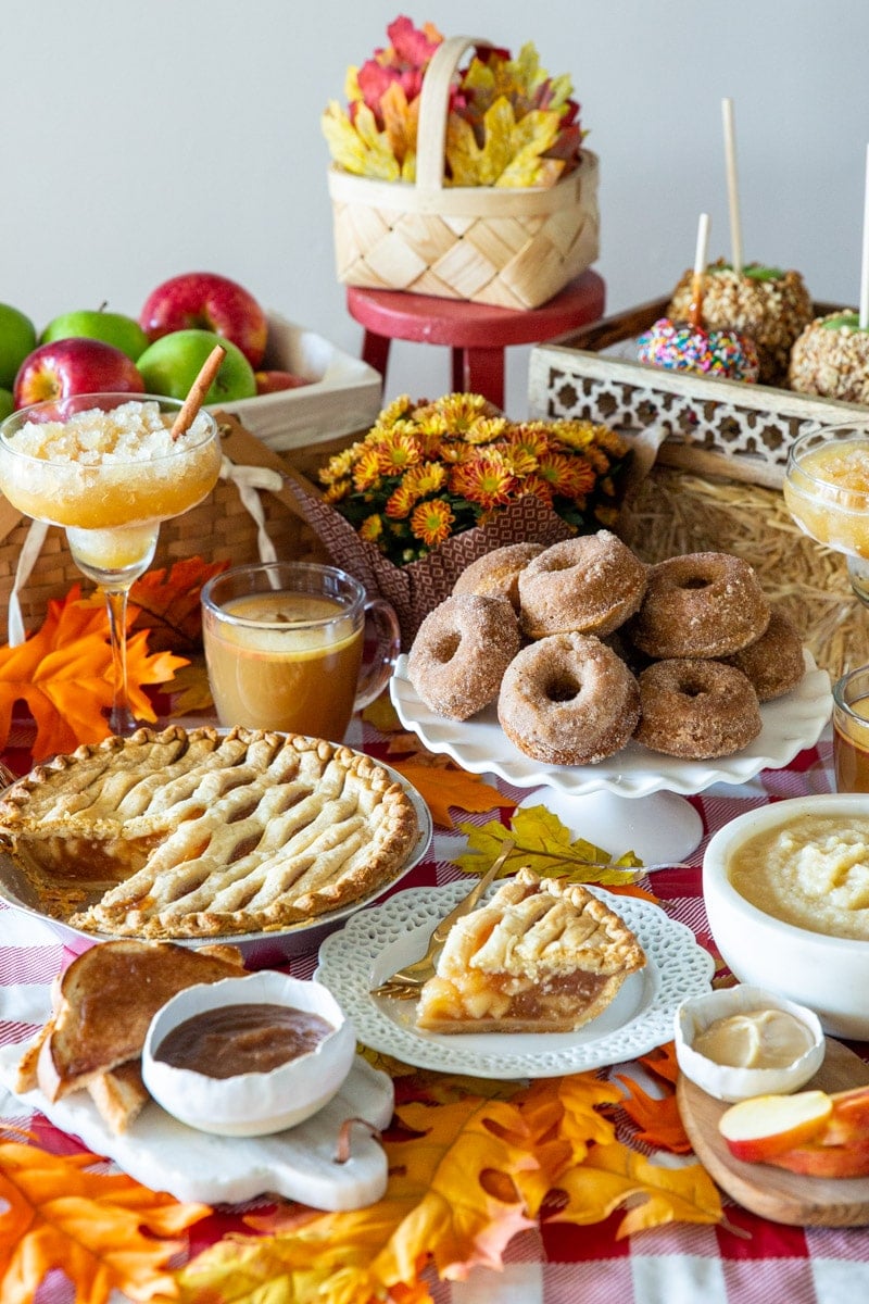 A table filled with apple-based recipes to inspire your fall apple picking harvest.