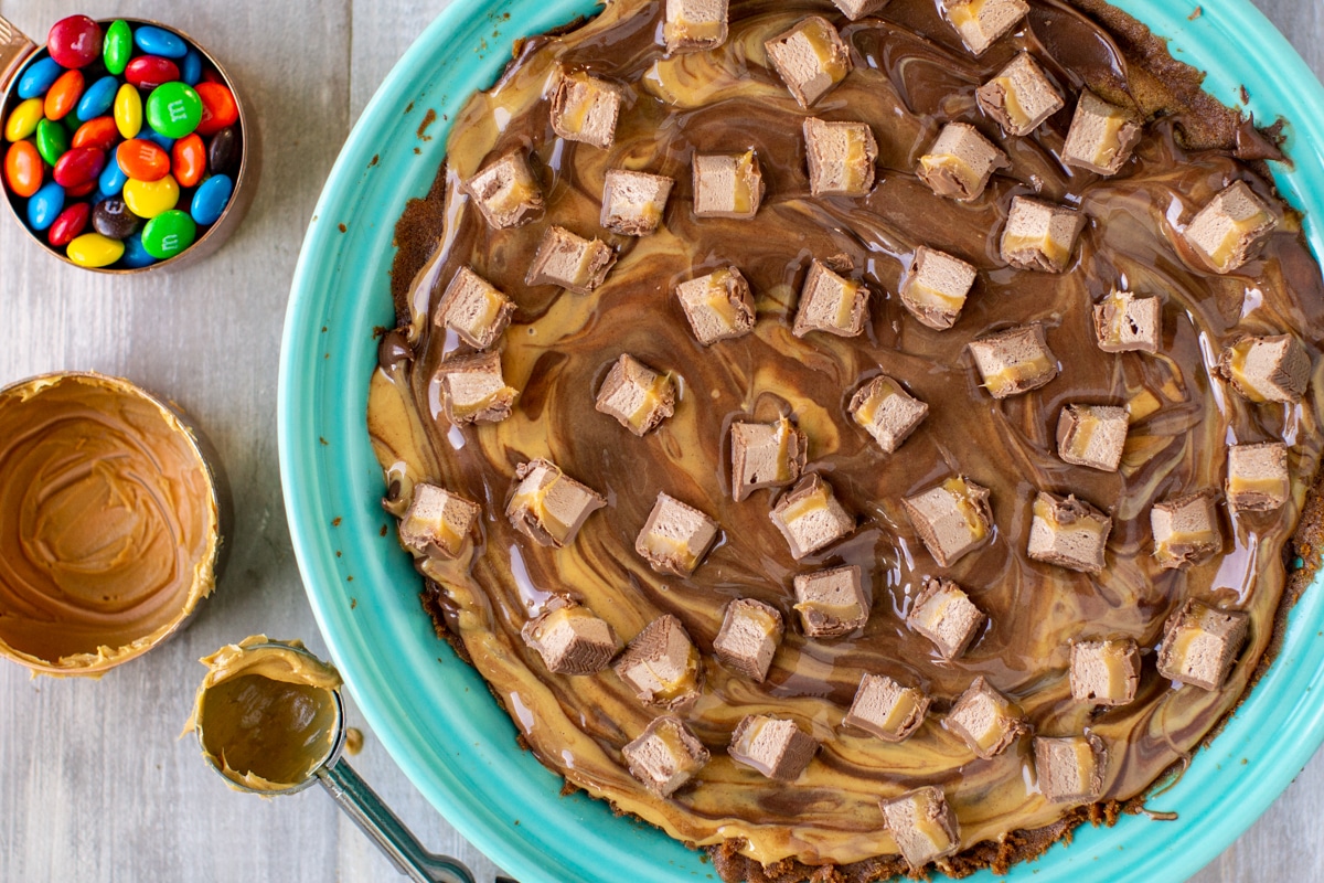 Building a chocolate chip cookie cake.