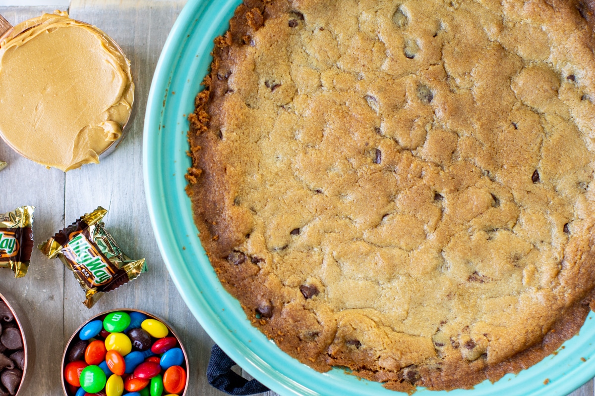 Building a chocolate chip cookie cake.