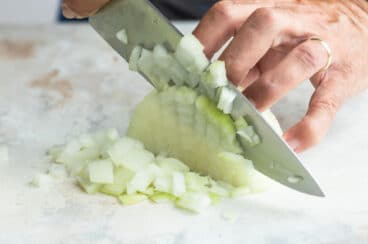 Dicing an onion.