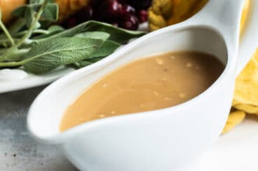 Turkey gravy in a white gravy boat.