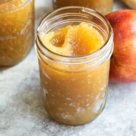 A mason jar filled with apple butter.