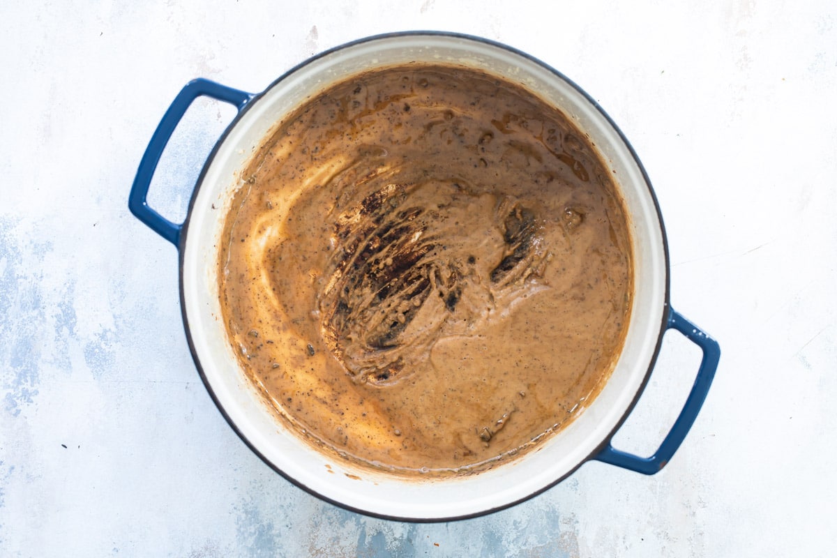 Sauce for chicken gumbo in a Dutch oven.