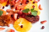 Citrus salad on a white plate.