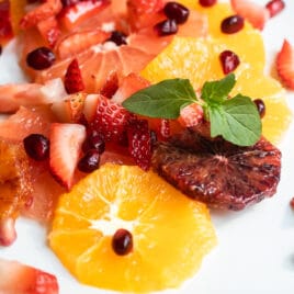 Citrus salad on a white plate.