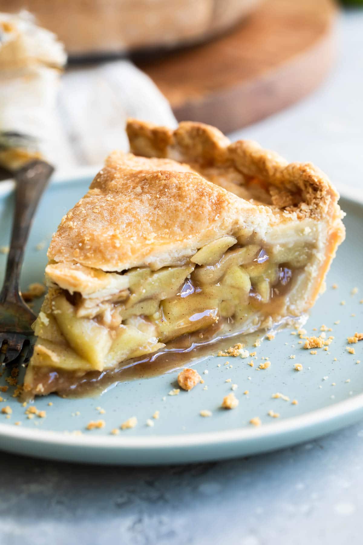 Slices of apple pie on plates.