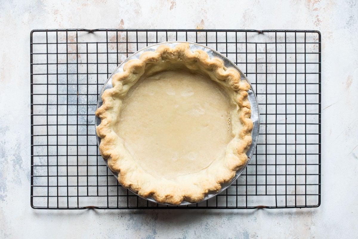 A an empty baked pie crust.