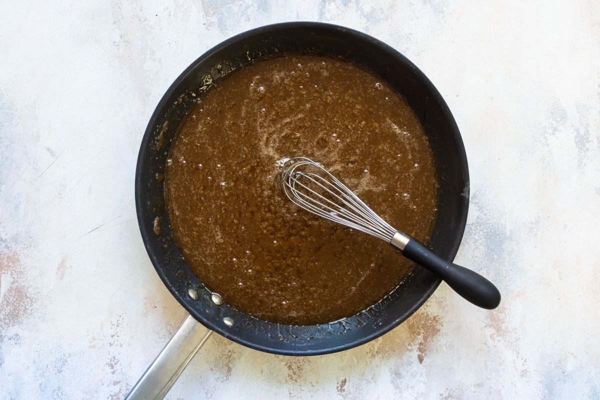 Pecan pie filling in a saucepan.