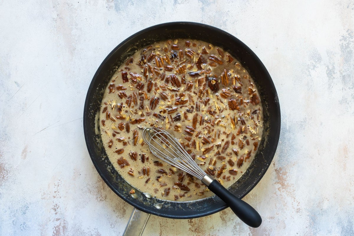 Pecan pie filling in a saucepan.