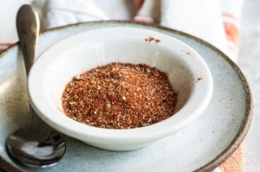 Creole seasoning in a white bowl.
