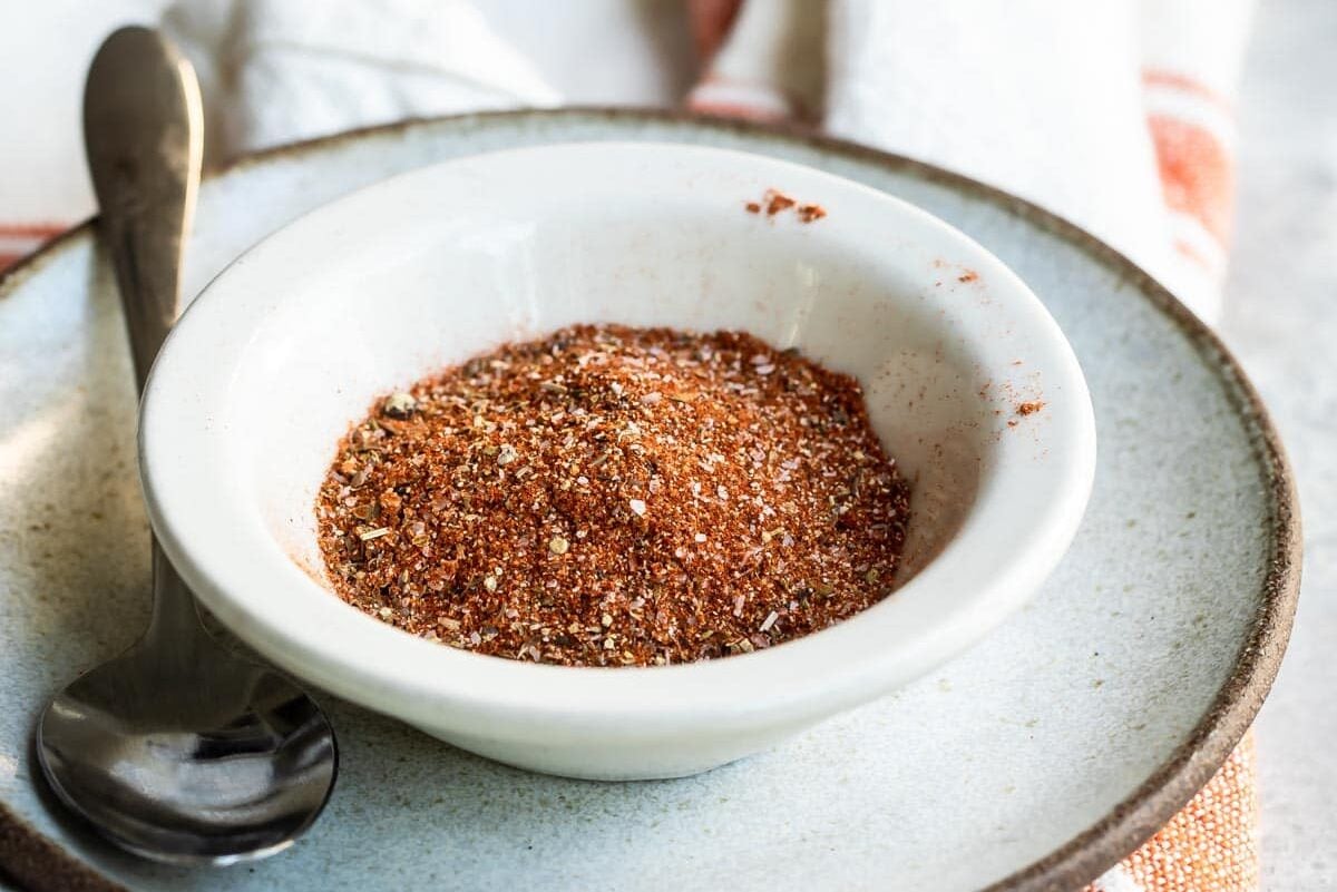 Creole seasoning in a white bowl.