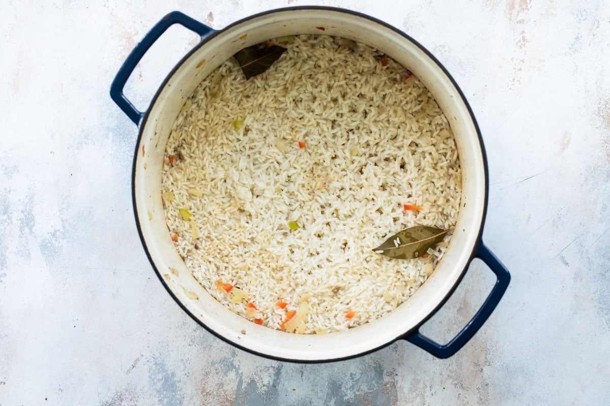 Cooked dirty rice in a Dutch oven.