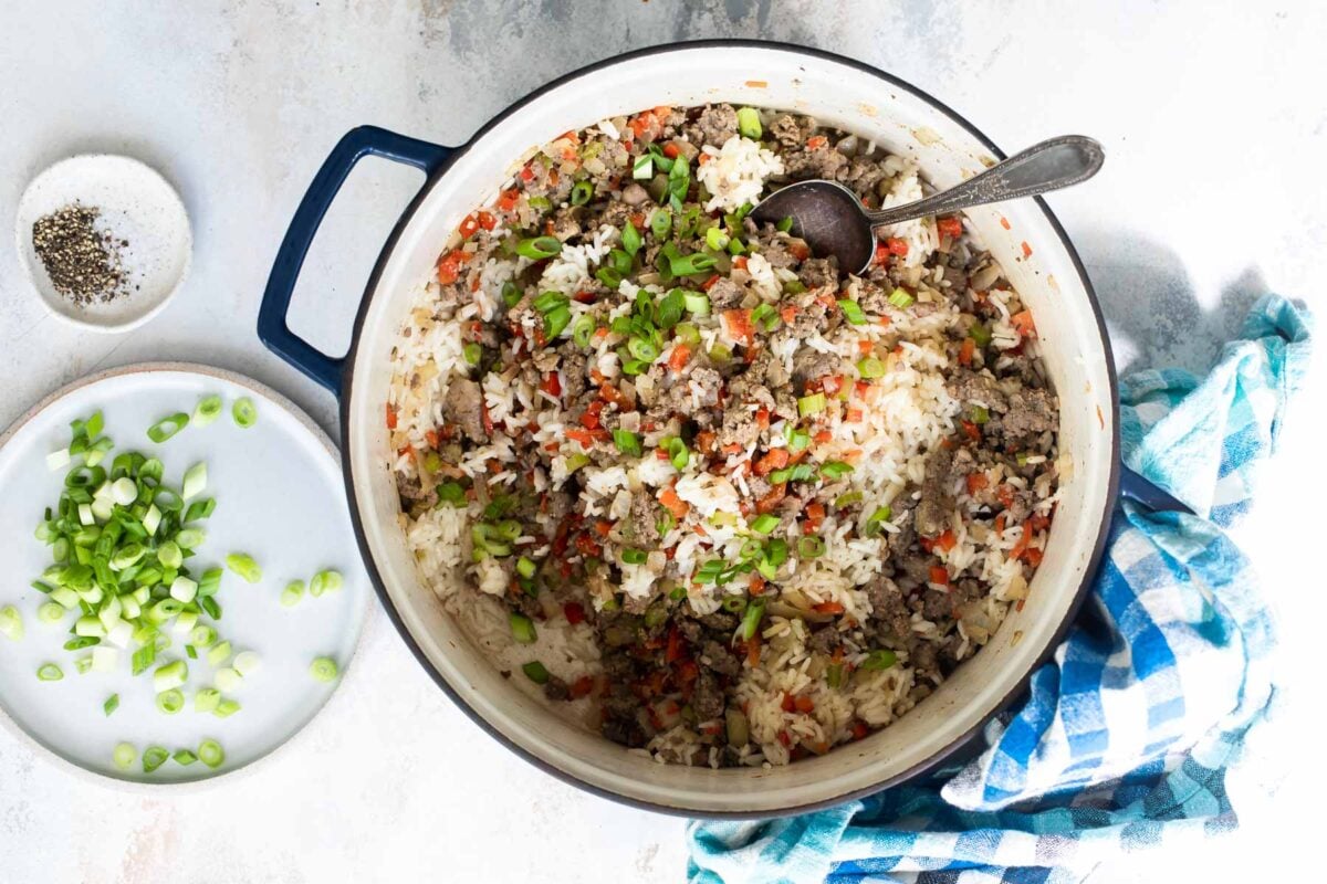 Cooked dirty rice in a Dutch oven.