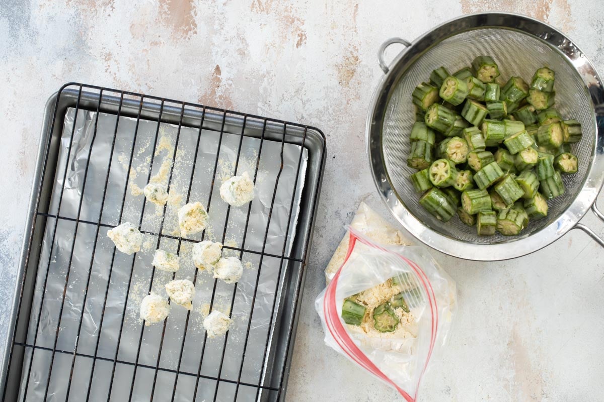 Pieces of okra being breaded.