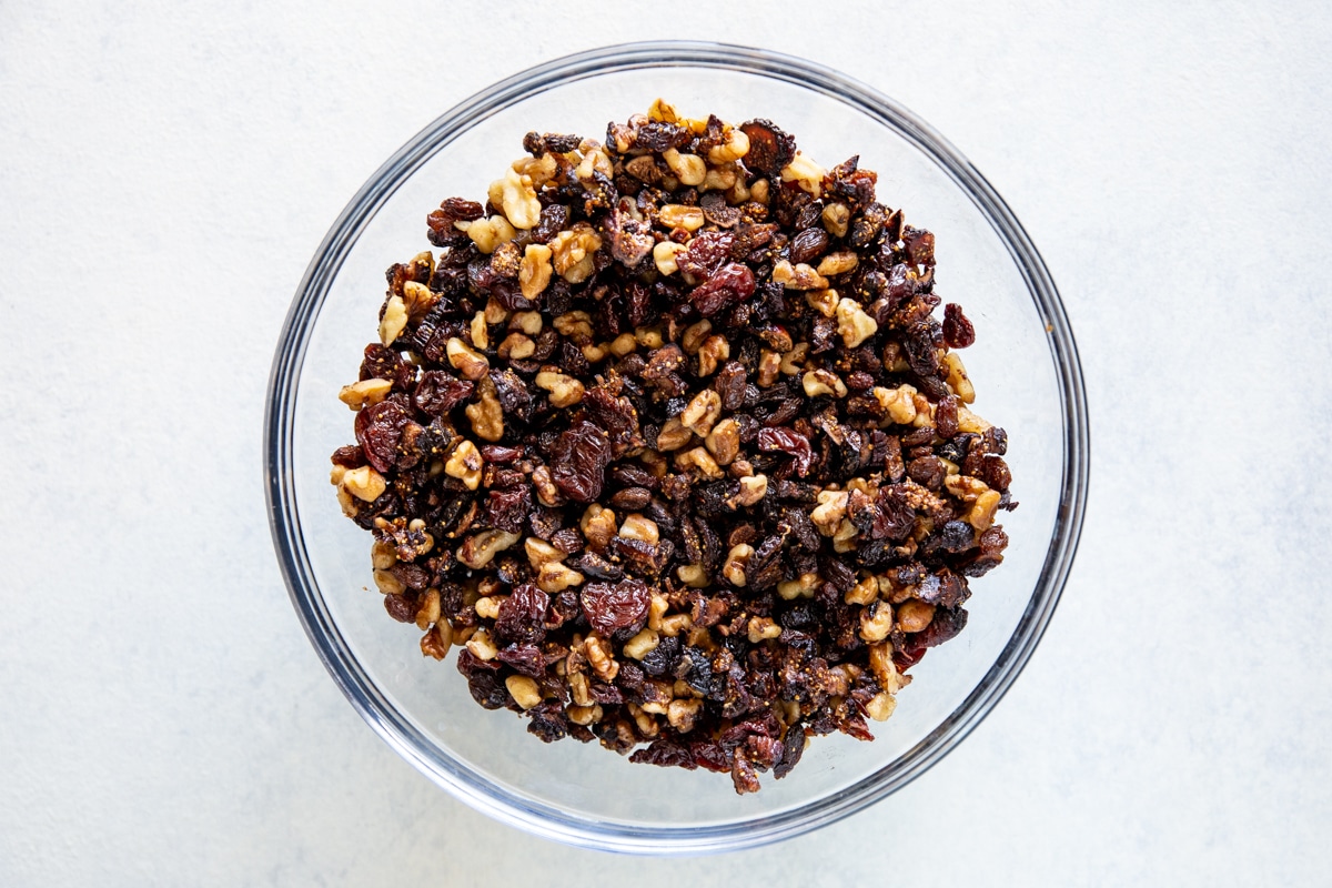 Dried fruit and nuts soaking for fruitcake cookies.