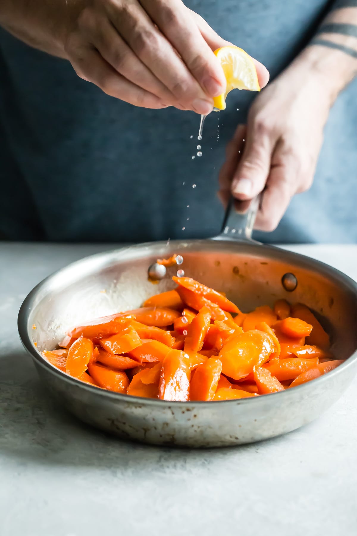 Glazed carrots in a saucepan.