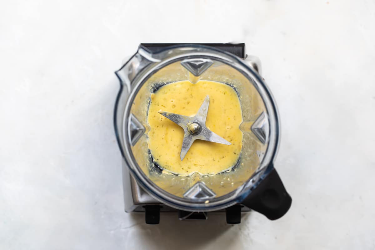 Mayonnaise being made in a blender.