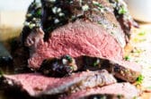 A sliced roast beef tenderloin.