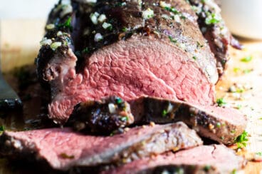 A sliced roast beef tenderloin.